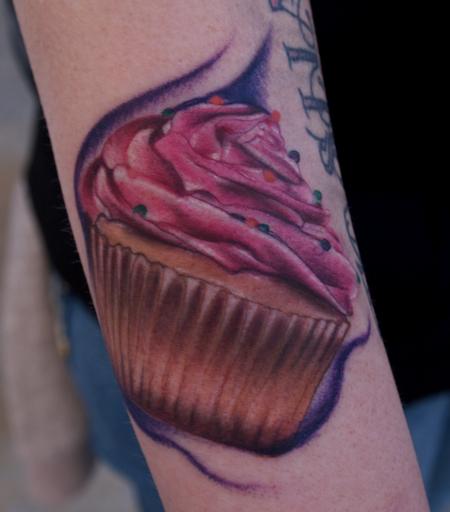 Ryan Mullins - colorful realistic cupcake tattoo